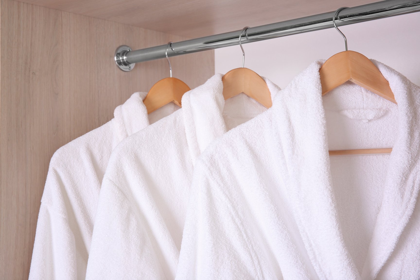 Bathrobes Hanging in Wardrobe